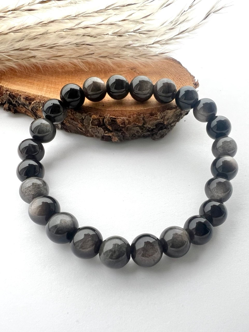 Bracciali di Ossidiana a Sfere: Eleganza in Diverse Misure