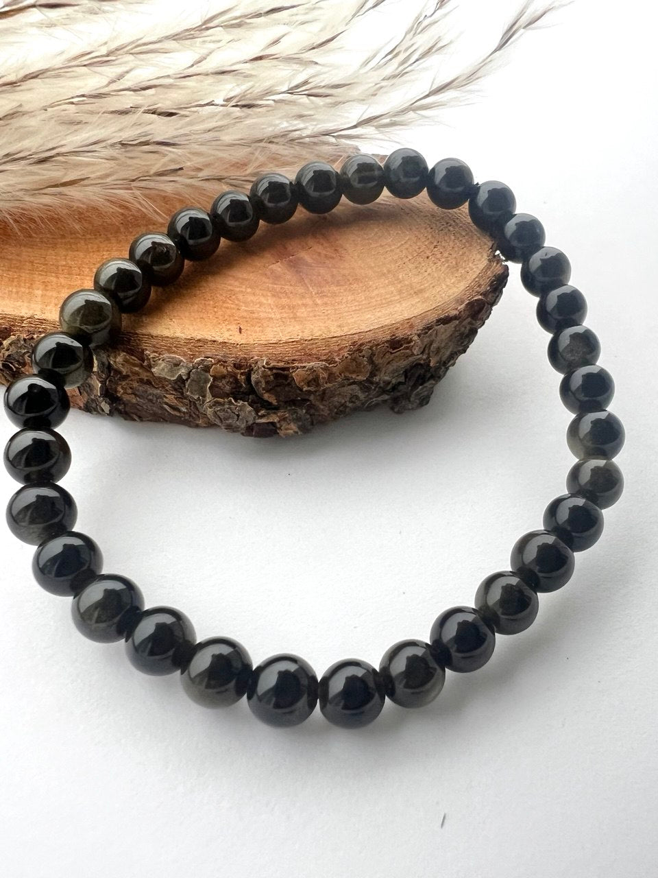 Bracciali di Ossidiana a Sfere: Eleganza in Diverse Misure