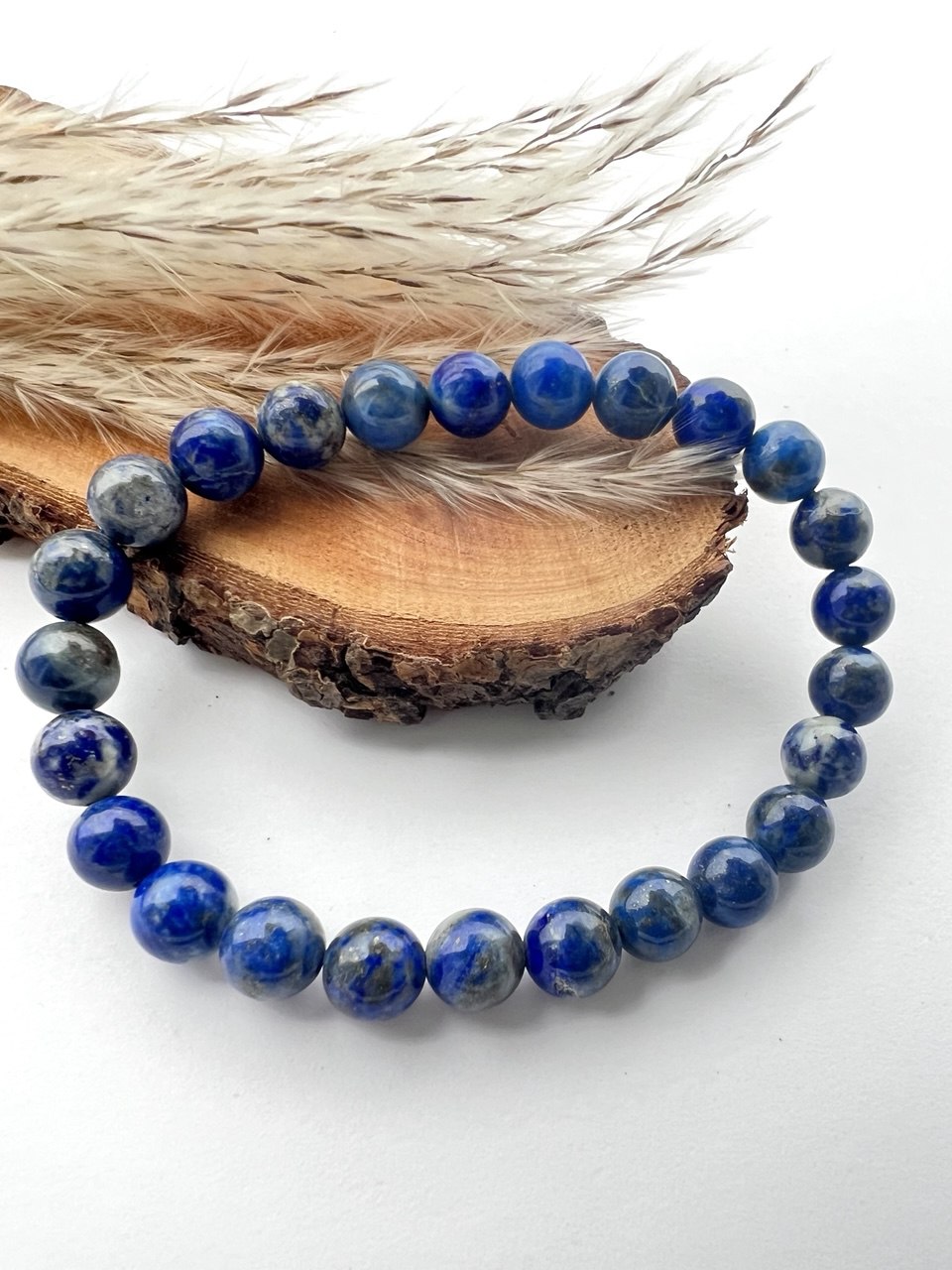Bracciale di Lapislazzuli a Sfere: Eleganza in Diverse Misure